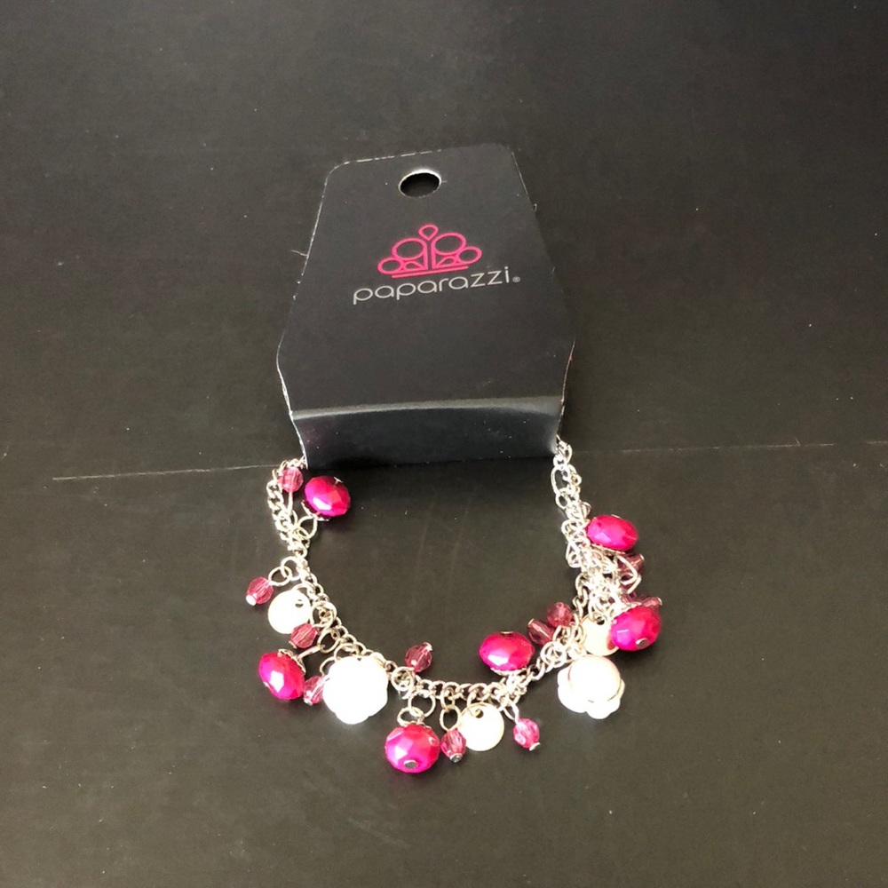 Pink gem and white rose charm bracelet